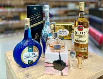 Bottles of liqueur as gifts to buy at Curaçao National Airport