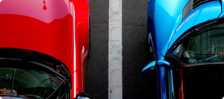 Two cars parked at Curaçao National Airport