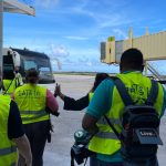 Employees of Curaçao National Airport waiting for a bus at the ‘Airport Safety & Security Week’